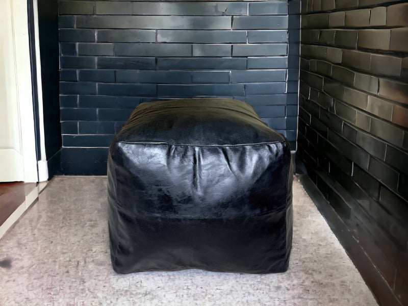 Moroccan Black Simple Square Pouf: An Enigmatic Tapestry of Berber Heritage - handmade by Moroccantastics - Berber craftsmanship, Black leather pouf, leather work, Moroccan décor, Moroccan furniture, Moroccan pouf, square pouf, Timeless pouf, Versatile pouf