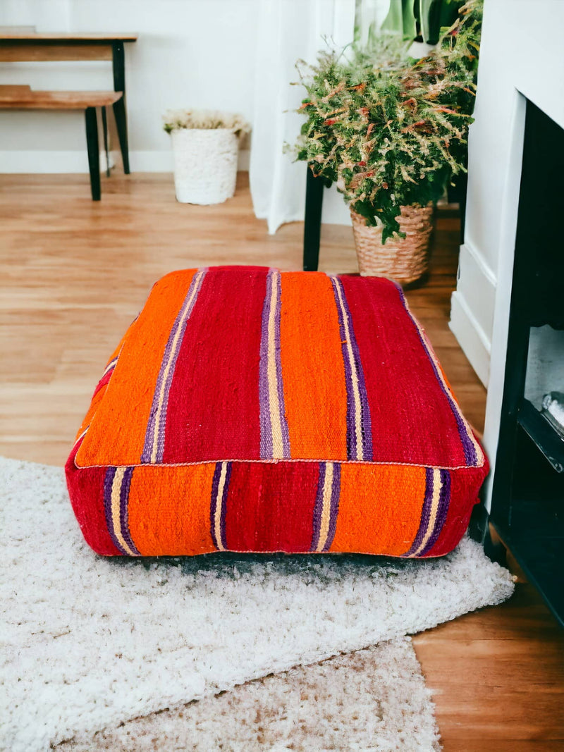 Authentic Moroccan charm in every thread. Unstuffed Berber rug pouf, crafted from 100% wool for warmth and comfort. A historic touch with a Moroccan pattern, ready for your personalization. Smooth zipper for easy customization. Embrace the authenticity delivered to your doorstep.