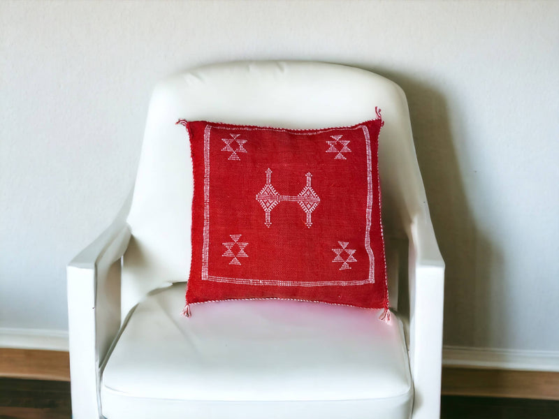 Handmade lumbar cushion with intricate Moroccan Sabra design, perfect for home decor.