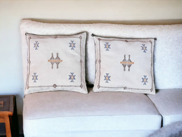 Handmade lumbar cushion with intricate Moroccan Sabra design, perfect for home decor.