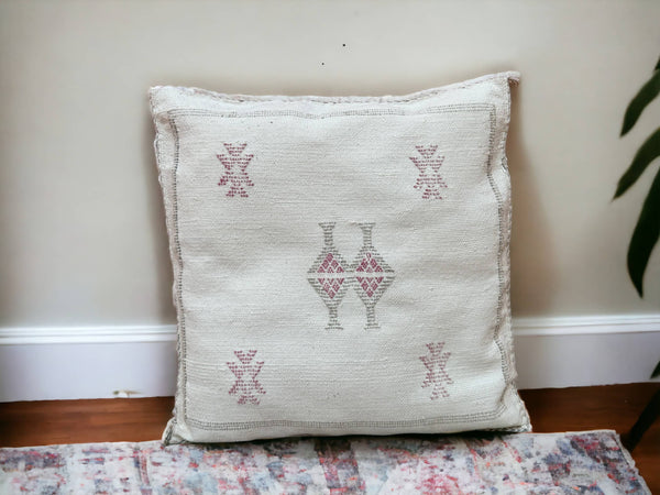 Handmade lumbar cushion with intricate Moroccan Sabra design, perfect for home decor.